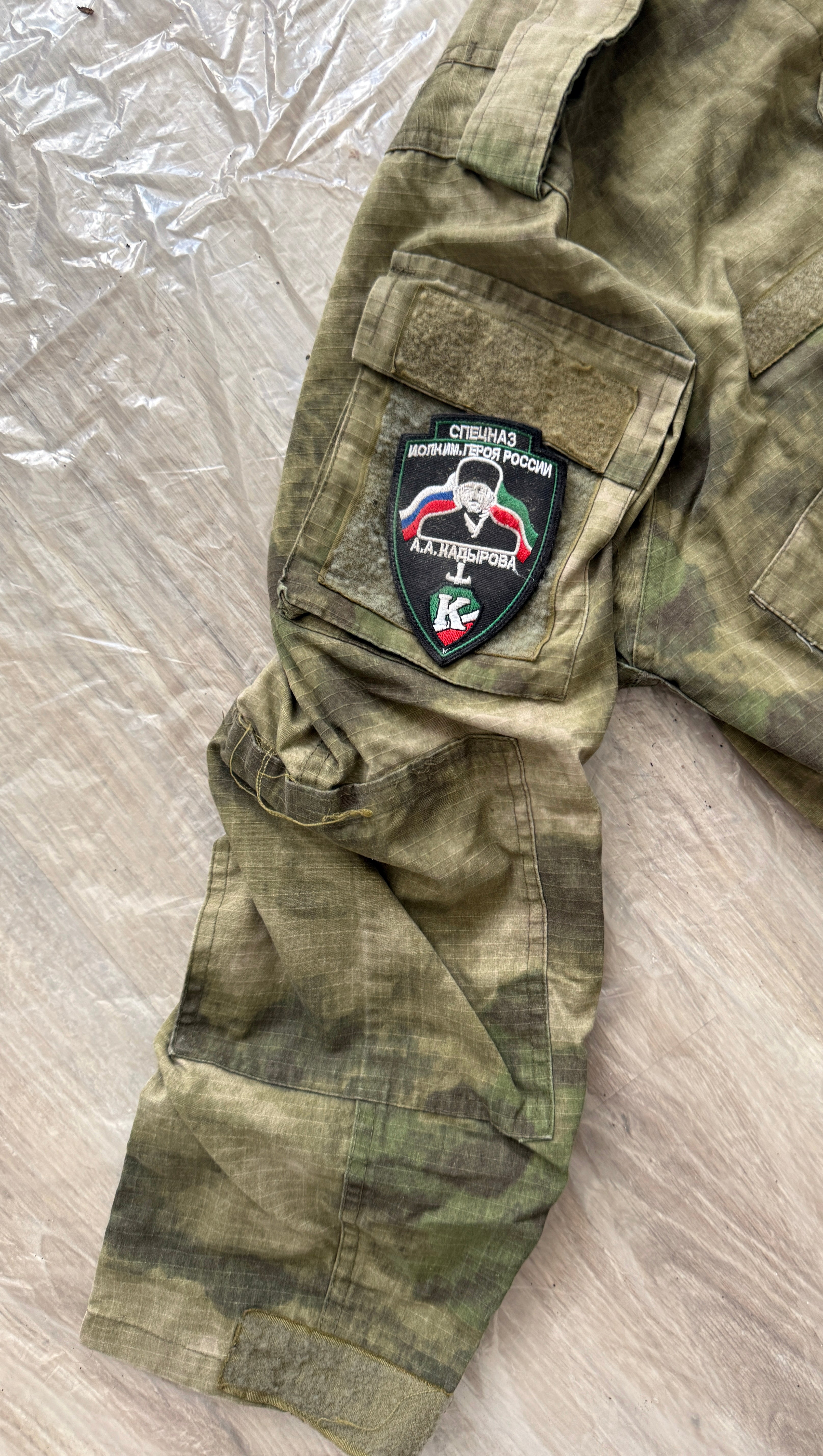 Trophy russian soldier uniform Kadyrovite Chechen jacket cap patch camo moss military army Russia Ukraine war 2022-2024